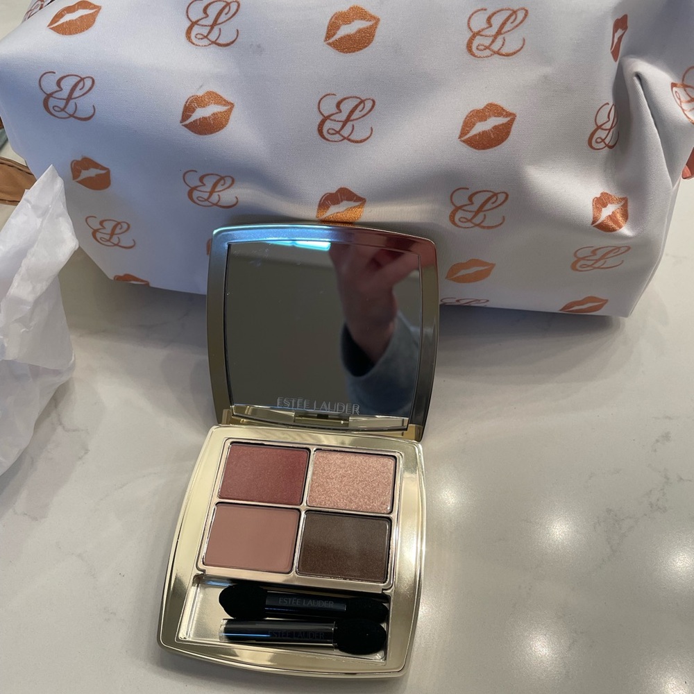 Estée Lauder eye shadow pallet and limited edition Estée Lauder makeup bag!